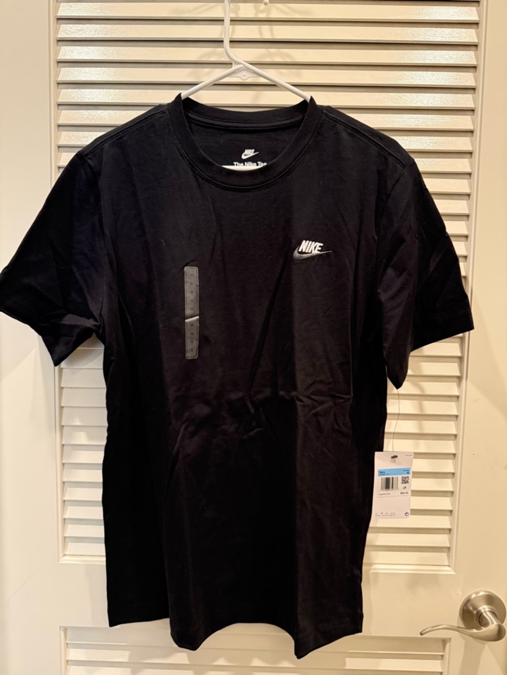 Nike Black Short-Sleeve T-Shirt with White Swoosh Logo